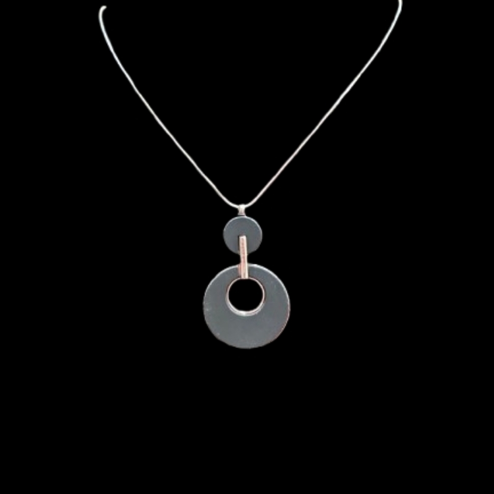 Recovered necklace with a pendant featuring two circular elements 20